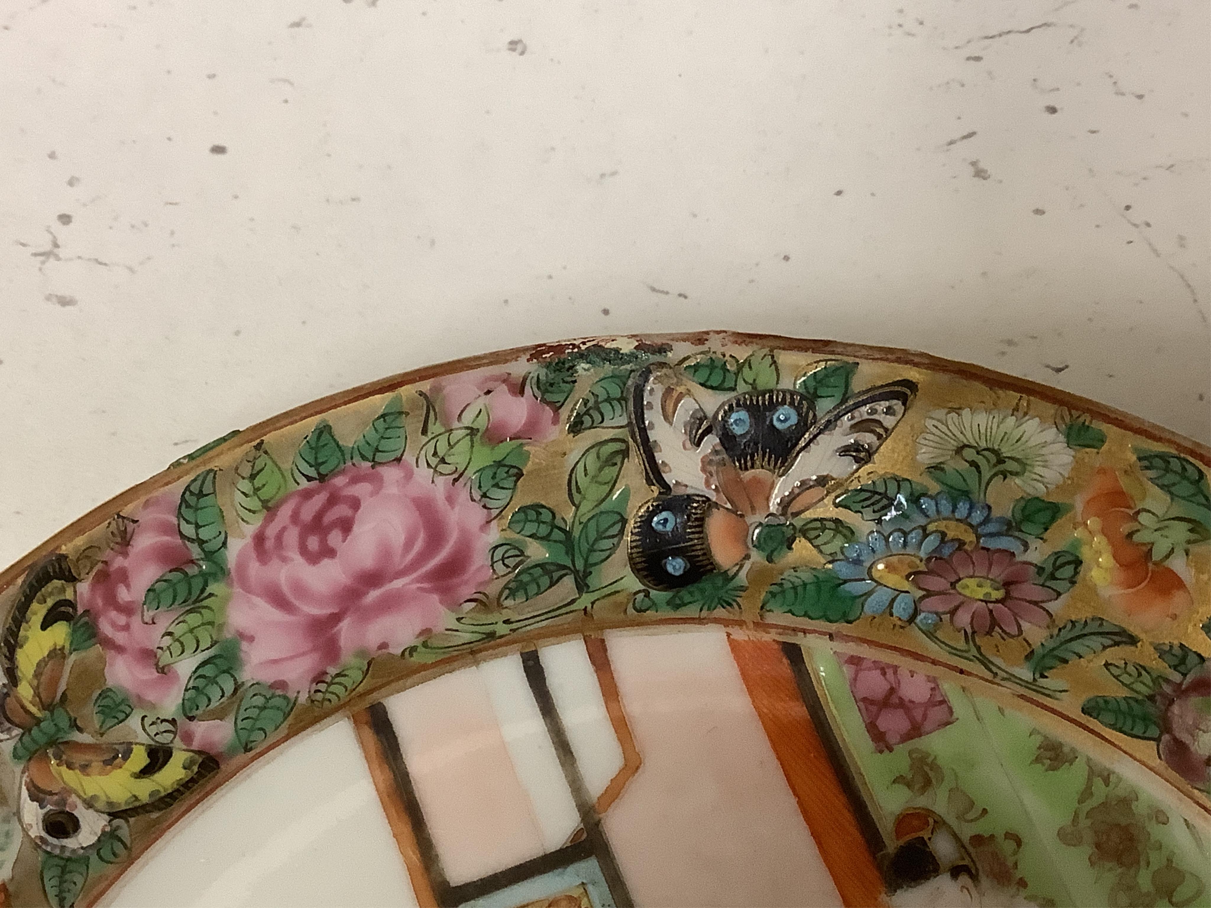 A collection of Chinese Canton figural plates, 19th century, together with an 18th century export famille rose saucer, largest 16cm (7)